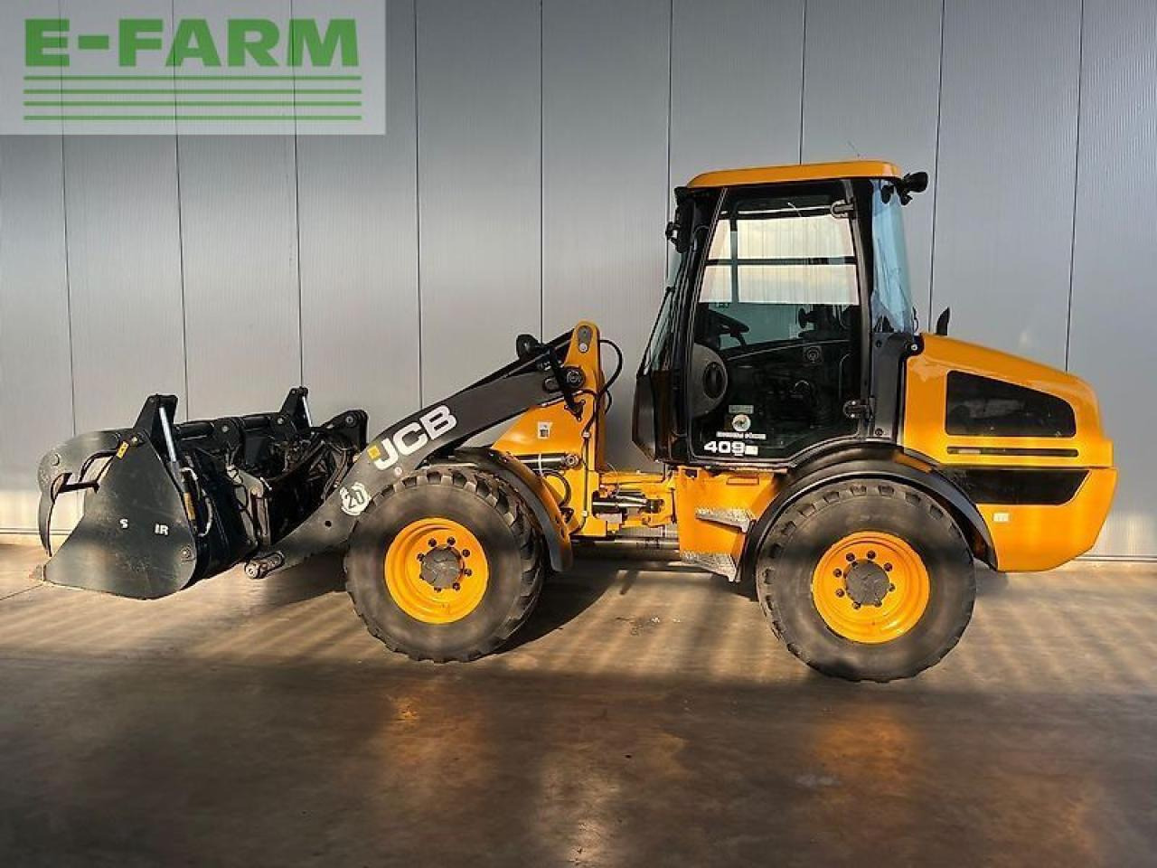JCB 409 agri - Minigraafmachine: afbeelding 1 JCB 409 agri - Minigraafmachine: afbeelding 1