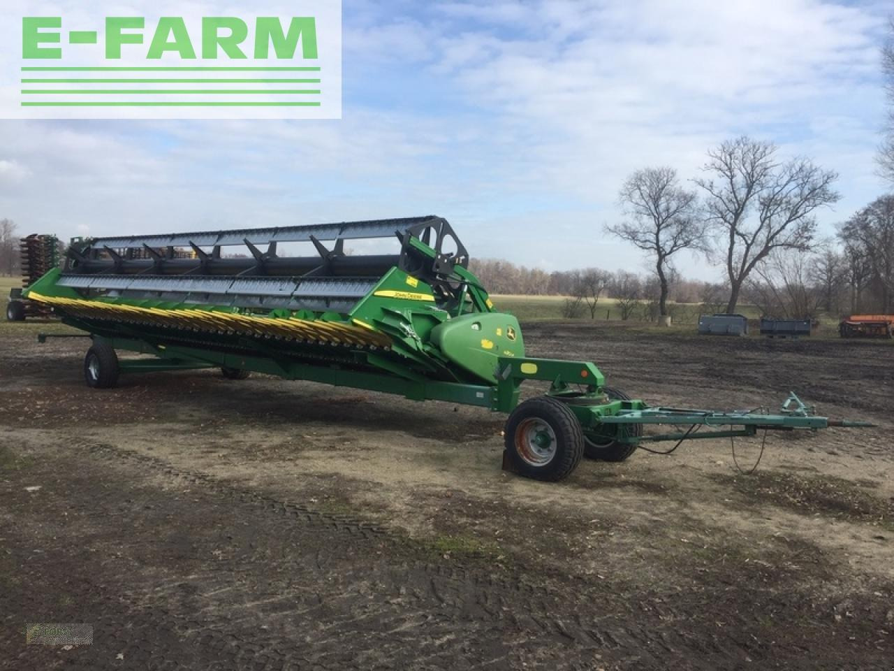 John Deere 630r mit sonnenblumenvorsatz - Tractor: afbeelding 1 John Deere 630r mit sonnenblumenvorsatz - Tractor: afbeelding 1