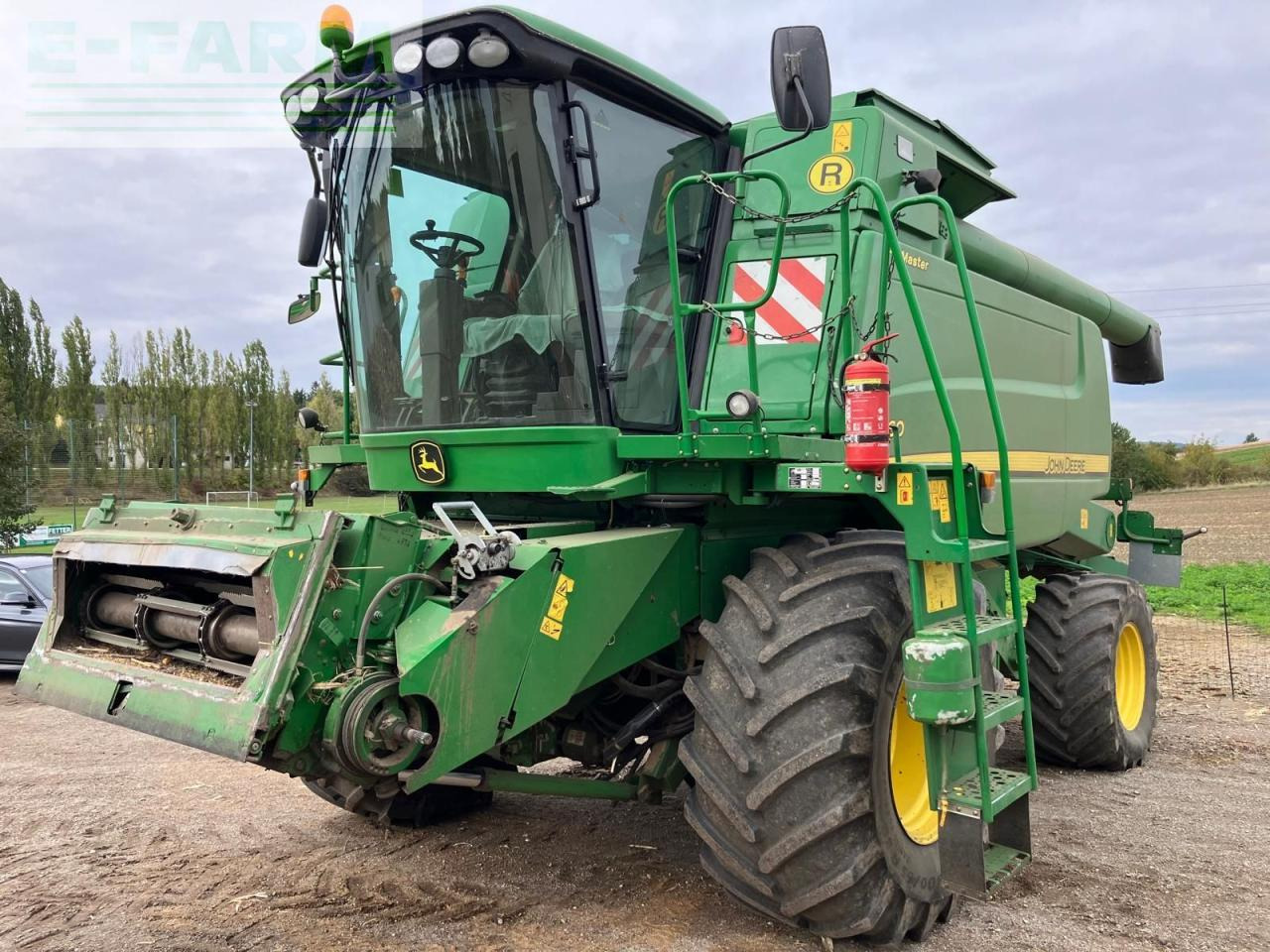 John Deere W660 HM - Maaidorser: afbeelding 1 John Deere W660 HM - Maaidorser: afbeelding 1