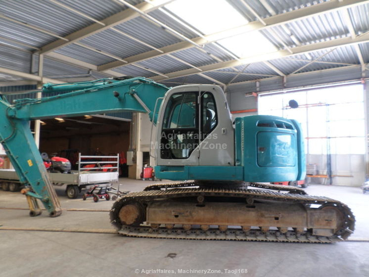 New Holland Kobelco Kobelco E 235 BSR-2 E 235 BSR-2 - Rupsgraafmachine: afbeelding 1 New Holland Kobelco Kobelco E 235 BSR-2 E 235 BSR-2 - Rupsgraafmachine: afbeelding 1