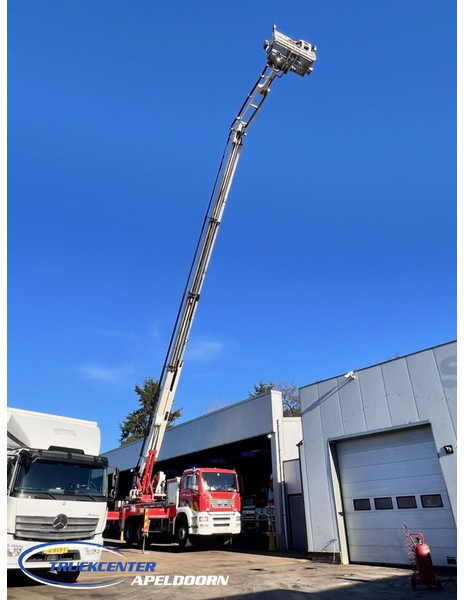 MAN TGA 26.350 Magirus ALP 320L = 32 meter, Waterpump, 6x4, Steel springs - Vrachtwagen: afbeelding 1 MAN TGA 26.350 Magirus ALP 320L = 32 meter, Waterpump, 6x4, Steel springs - Vrachtwagen: afbeelding 1