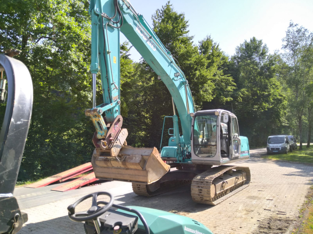 KOBELCO SK 210 NLC-6E - Rupsgraafmachine: afbeelding 1 KOBELCO SK 210 NLC-6E - Rupsgraafmachine: afbeelding 1
