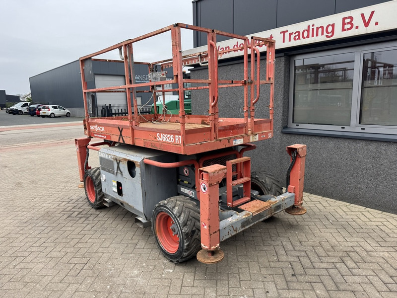 Skyjack SJ 6826RT Schaarhoogwerker / Scissor / Arbeitsbuhne 2015 4X4 Kubota Diesel 10M Werkhoogte - Schaarlift: afbeelding 3 Skyjack SJ 6826RT Schaarhoogwerker / Scissor / Arbeitsbuhne 2015 4X4 Kubota Diesel 10M Werkhoogte - Schaarlift: afbeelding 3