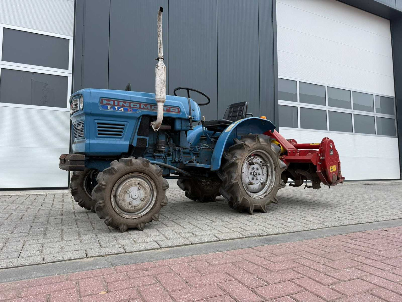 Hinomoto E-14 met Grondfrees - Mini tractor: afbeelding 1 Hinomoto E-14 met Grondfrees - Mini tractor: afbeelding 1