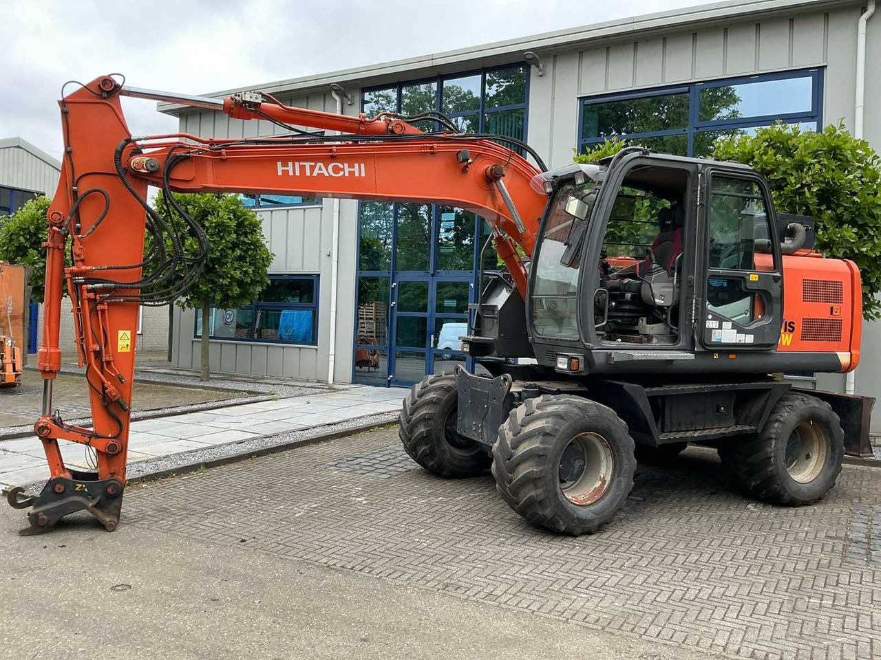Hitachi ZX140W-3 - Mobiele graafmachine: afbeelding 1 Hitachi ZX140W-3 - Mobiele graafmachine: afbeelding 1