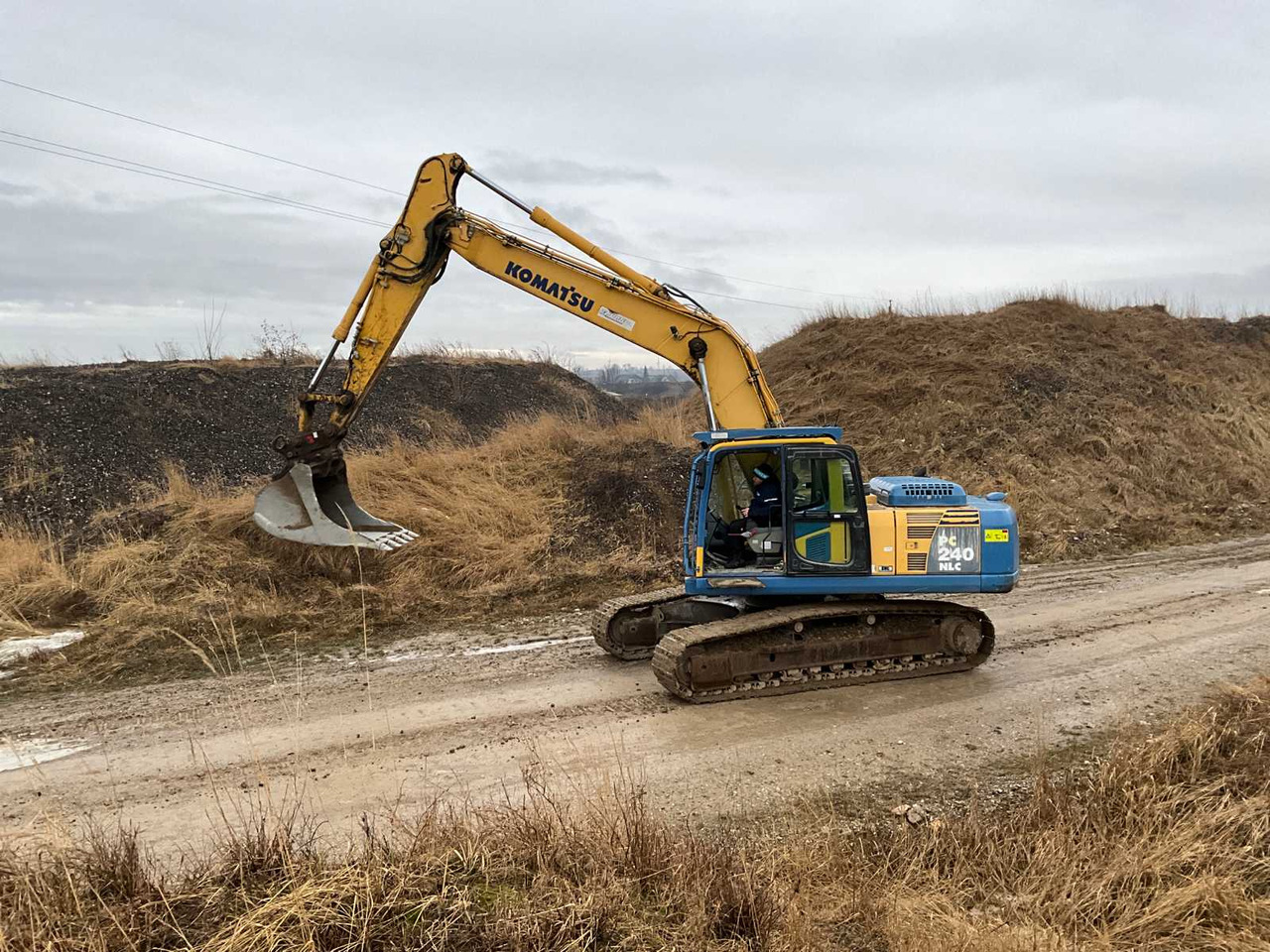 Komatsu PC240ONLC-8 - Rupsgraafmachine: afbeelding 1 Komatsu PC240ONLC-8 - Rupsgraafmachine: afbeelding 1