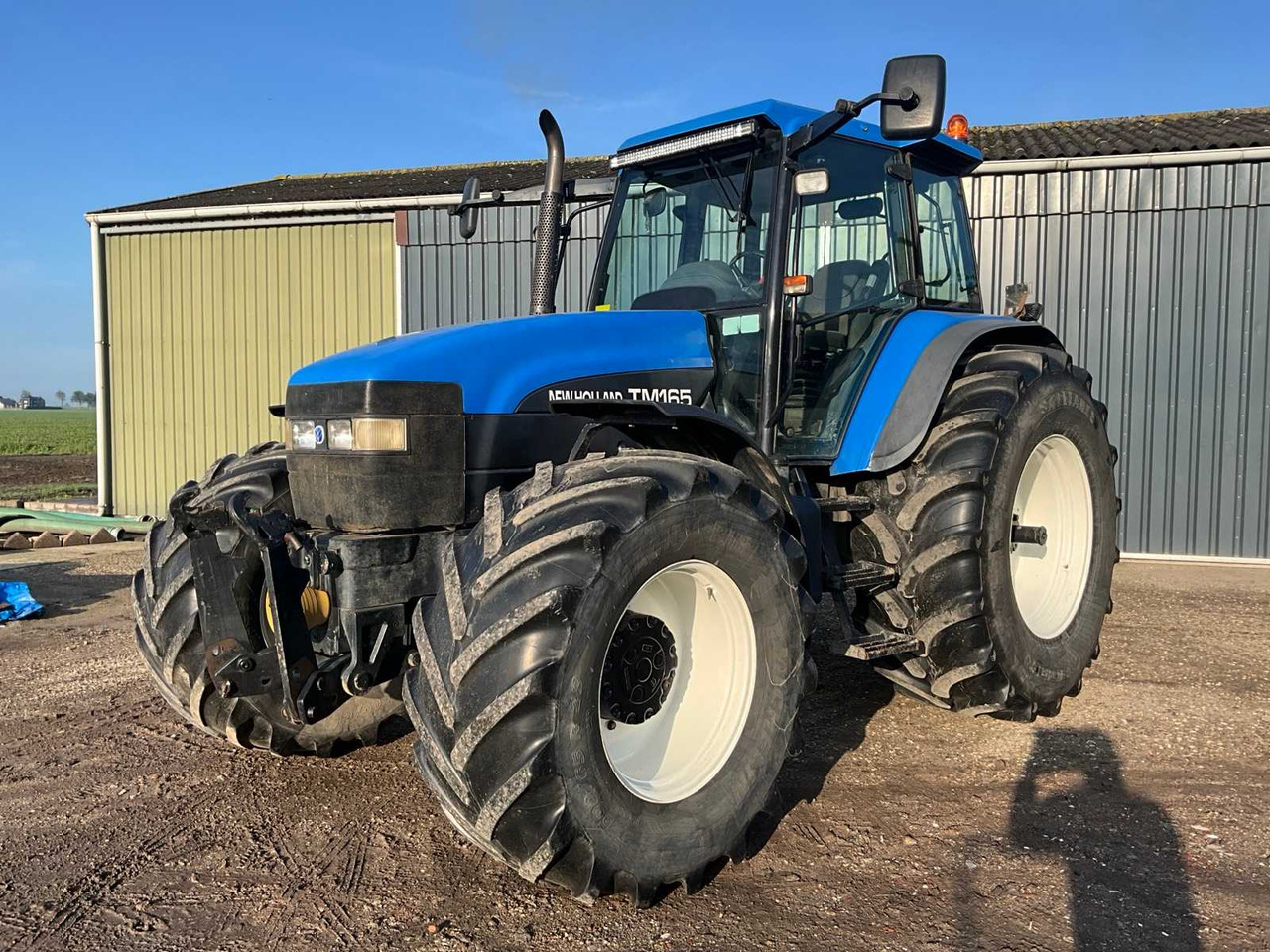 New Holland TM165 - Tractor: afbeelding 1 New Holland TM165 - Tractor: afbeelding 1