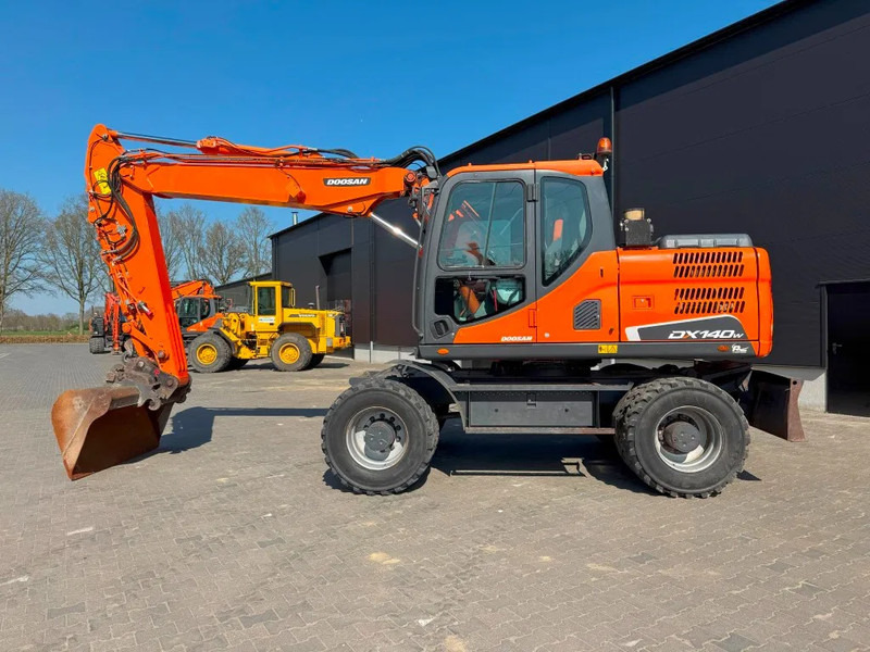 Doosan DX140-3 6000 uur ! NL Machine - Mobiele graafmachine: afbeelding 1 Doosan DX140-3 6000 uur ! NL Machine - Mobiele graafmachine: afbeelding 1