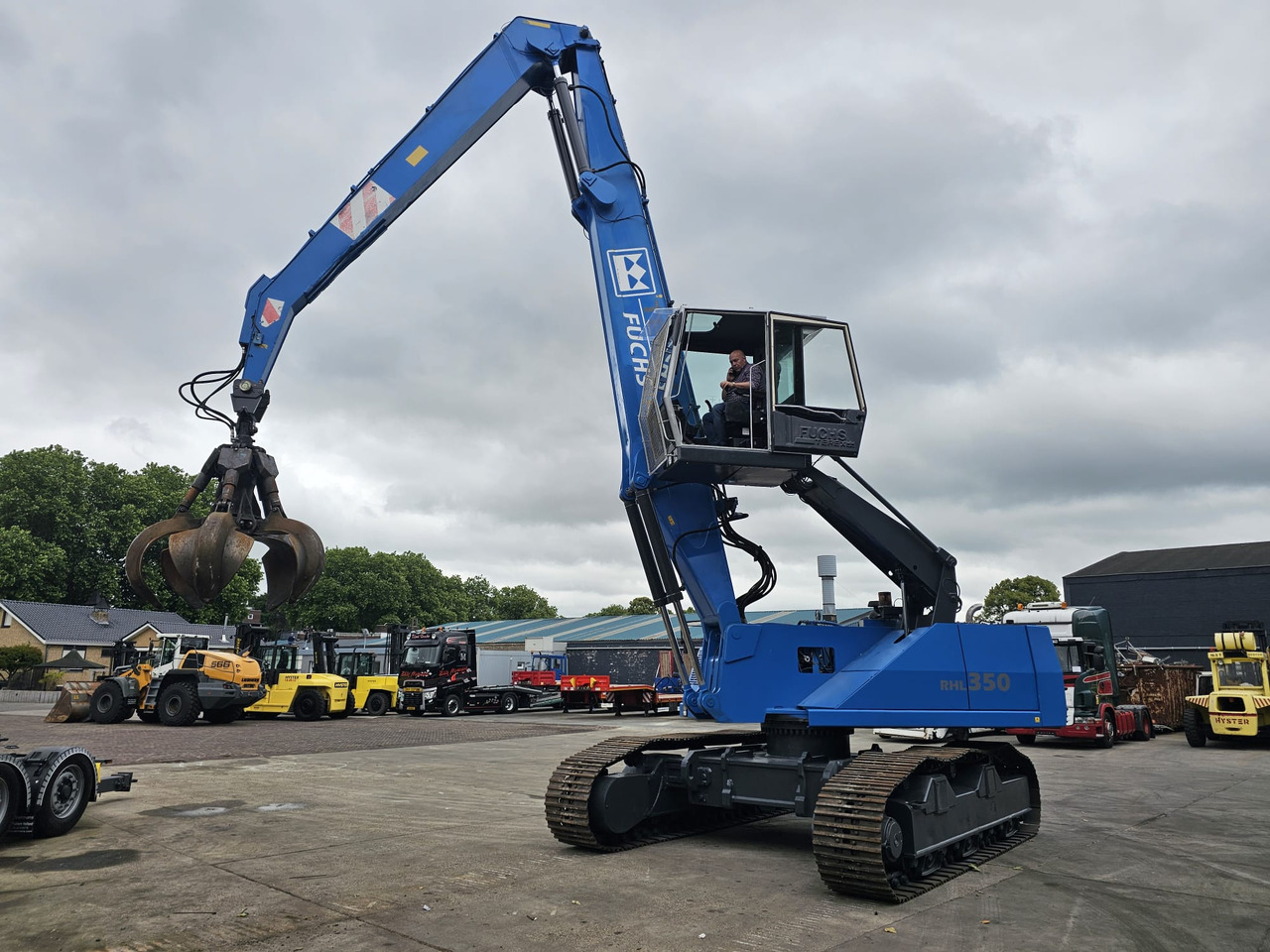 Fuchs RHL 350 Materialhandler With Adjustable Tracks - Overslagkraan: afbeelding 1 Fuchs RHL 350 Materialhandler With Adjustable Tracks - Overslagkraan: afbeelding 1