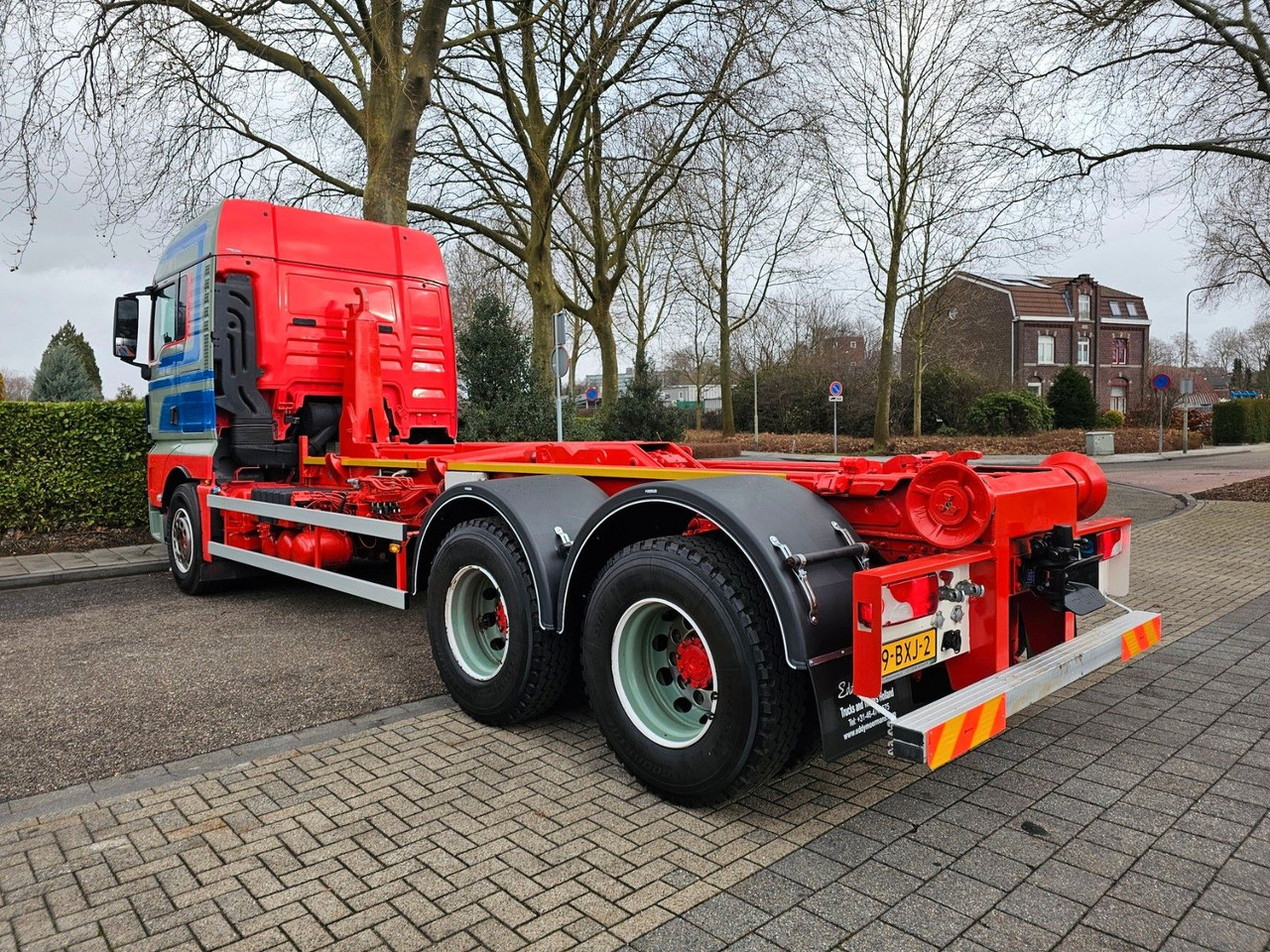 MAN TGX 26.560 XLX 6x4 Abrollkipper - Haakarmsysteem vrachtwagen: afbeelding 2 MAN TGX 26.560 XLX 6x4 Abrollkipper - Haakarmsysteem vrachtwagen: afbeelding 2
