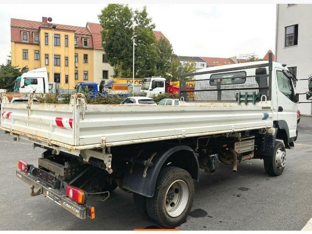 Mitsubishi Fuso 4x4 3 way tipper - Kipper vrachtwagen: afbeelding 4 Mitsubishi Fuso 4x4 3 way tipper - Kipper vrachtwagen: afbeelding 4