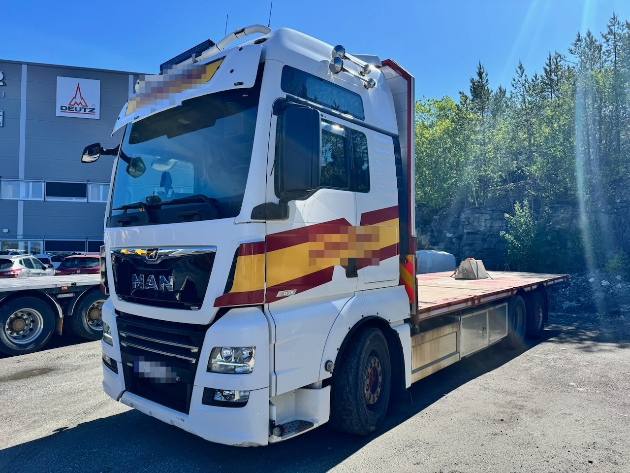 MAN TGX 580 - Vrachtwagen met open laadbak: afbeelding 1 MAN TGX 580 - Vrachtwagen met open laadbak: afbeelding 1