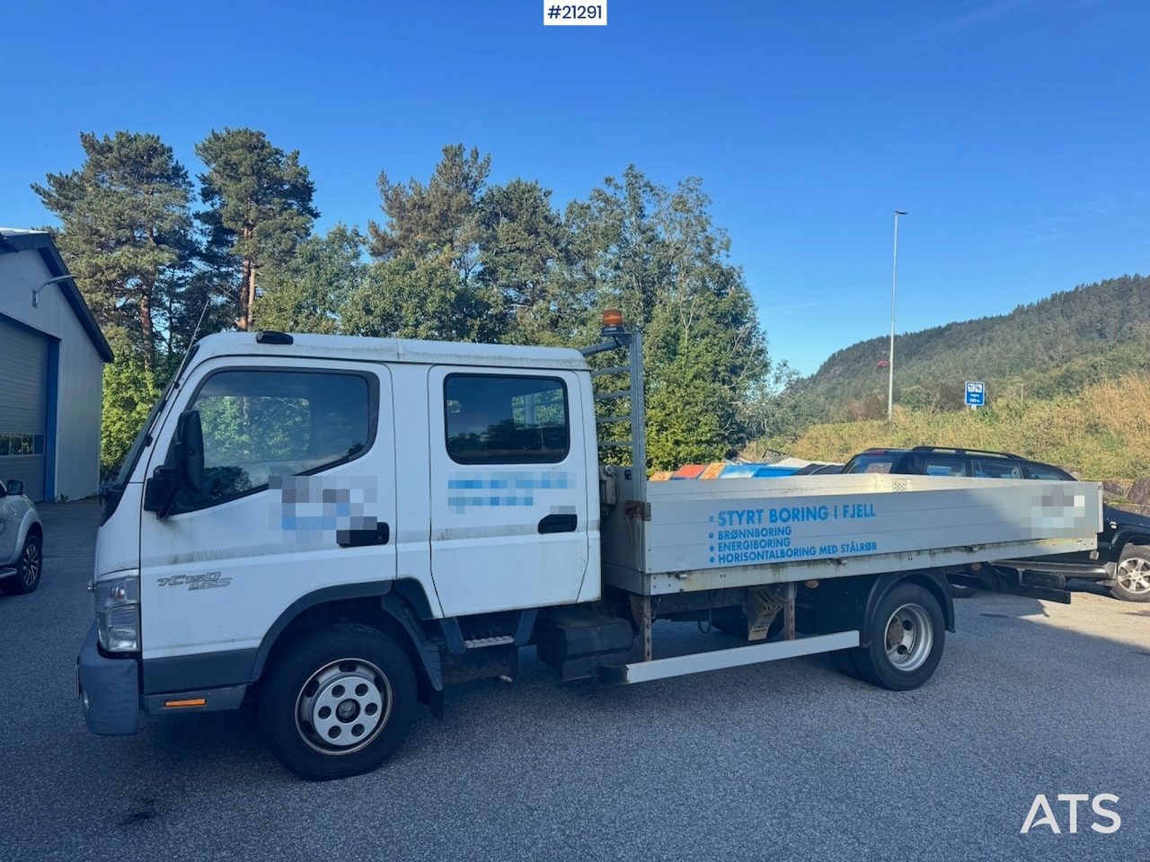 Mitsubishi Fuso Canter - Vrachtwagen met open laadbak: afbeelding 2 Mitsubishi Fuso Canter - Vrachtwagen met open laadbak: afbeelding 2