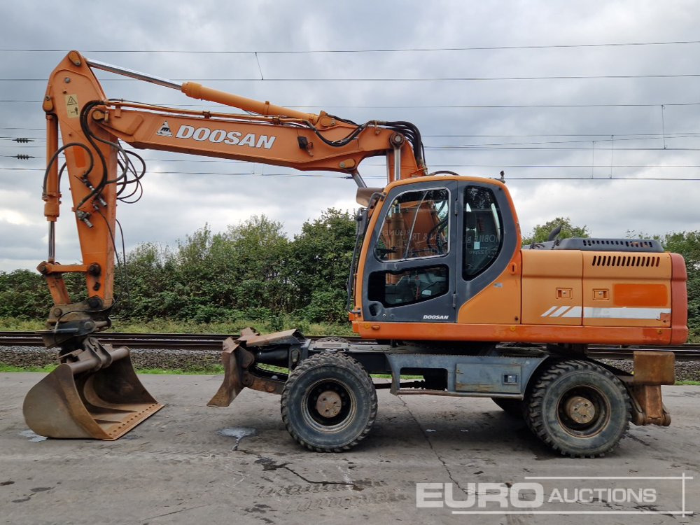 Doosan DX210W - Mobiele graafmachine: afbeelding 2 Doosan DX210W - Mobiele graafmachine: afbeelding 2