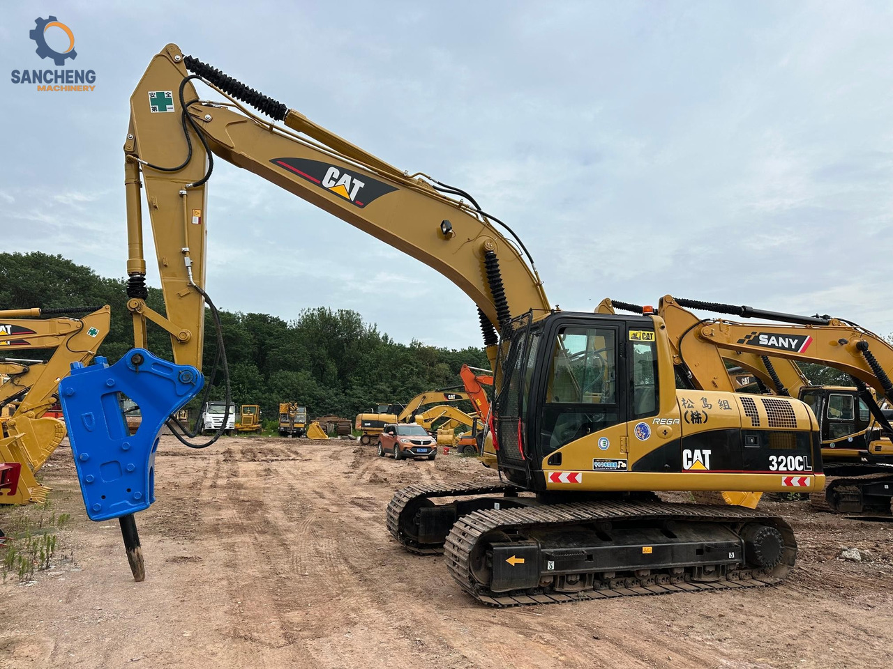 CAT 320CL with hammer crawler excavator - Rupsgraafmachine: afbeelding 1 CAT 320CL with hammer crawler excavator - Rupsgraafmachine: afbeelding 1