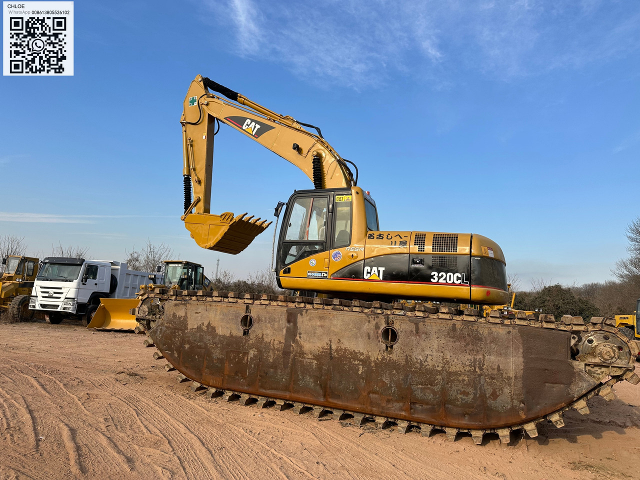 CATERPILLAR 320CL - Amfibische graafmachine: afbeelding 1 CATERPILLAR 320CL - Amfibische graafmachine: afbeelding 1