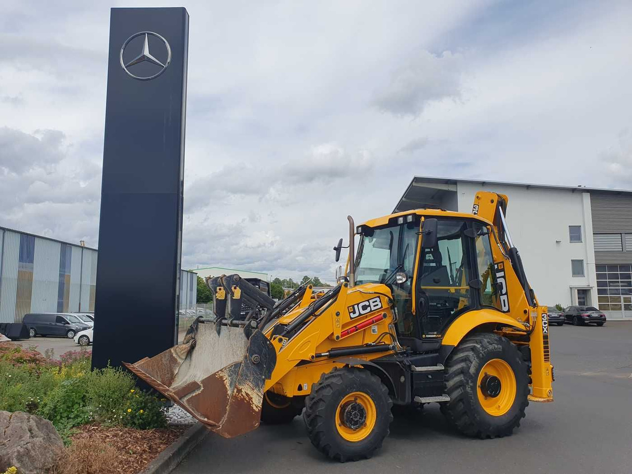JCB 3CX / Gabel & 4in1 Schaufel / nur 1.561h / 2022 - Graaflaadmachine: afbeelding 1 JCB 3CX / Gabel & 4in1 Schaufel / nur 1.561h / 2022 - Graaflaadmachine: afbeelding 1