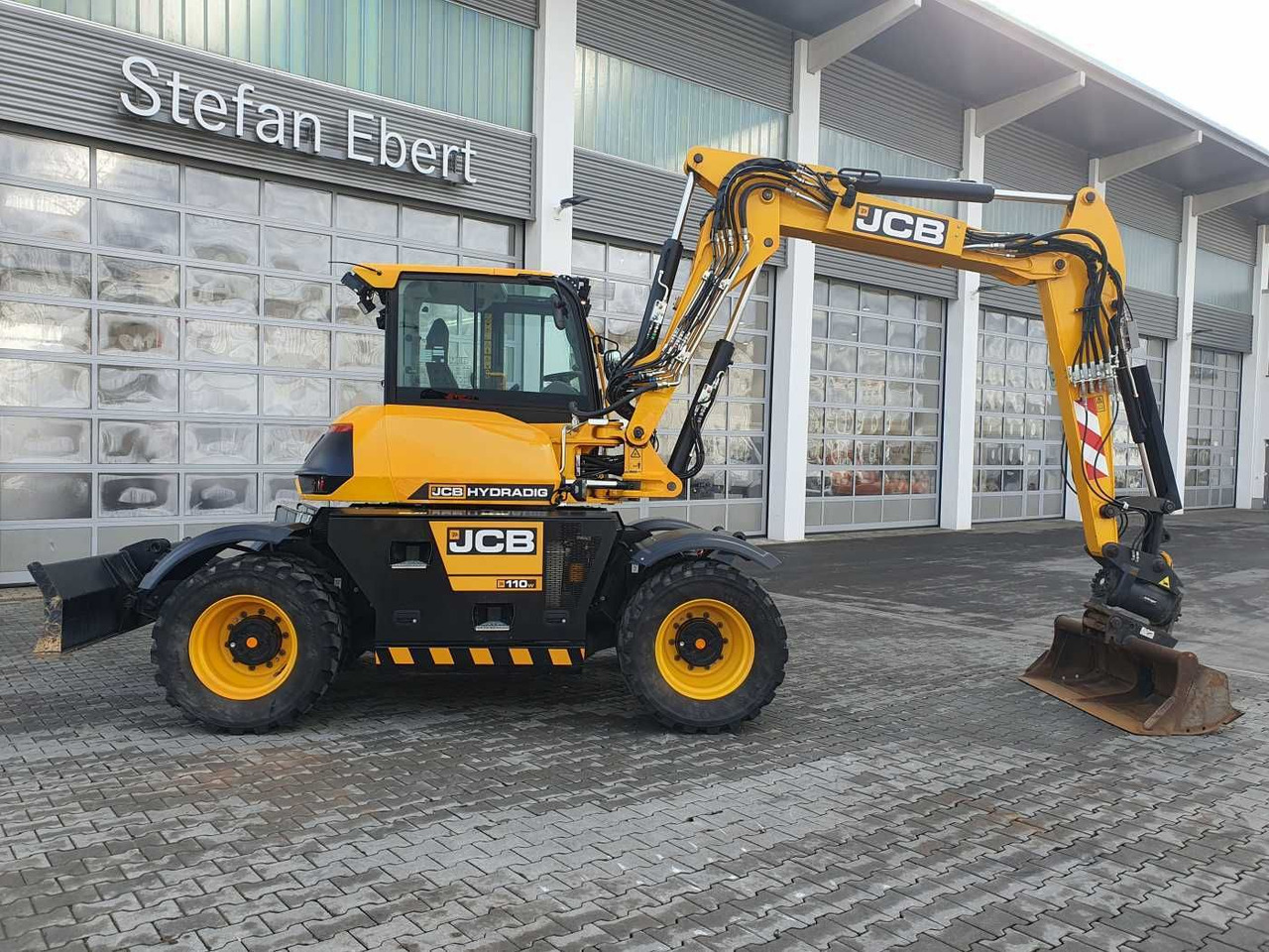 JCB Hydradig HD 110WT / 2022 / nur 239h! / Powertilt - Mobiele graafmachine: afbeelding 2 JCB Hydradig HD 110WT / 2022 / nur 239h! / Powertilt - Mobiele graafmachine: afbeelding 2