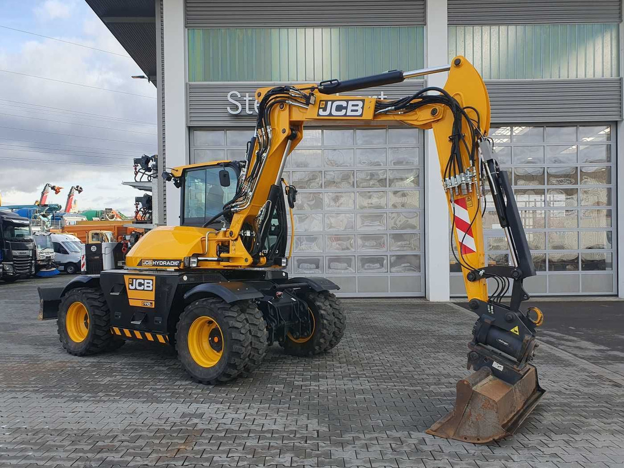 JCB Hydradig HD 110WT / 2022 / nur 239h! / Powertilt - Mobiele graafmachine: afbeelding 1 JCB Hydradig HD 110WT / 2022 / nur 239h! / Powertilt - Mobiele graafmachine: afbeelding 1