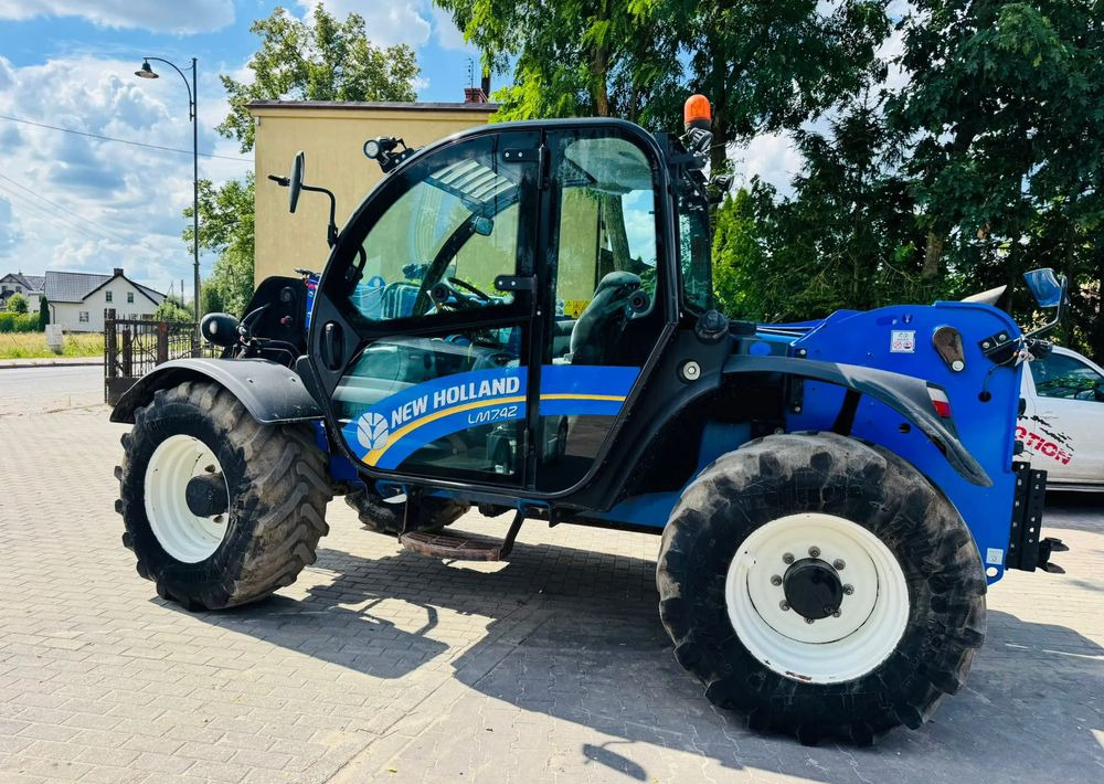 New Holland L7.42 - Verreiker: afbeelding 1 New Holland L7.42 - Verreiker: afbeelding 1