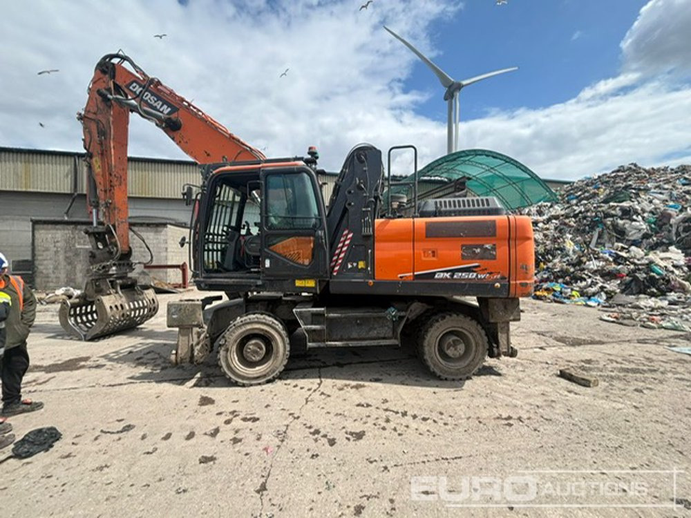 2023 Doosan DX250WMH-7 - Mobiele graafmachine: afbeelding 1 2023 Doosan DX250WMH-7 - Mobiele graafmachine: afbeelding 1