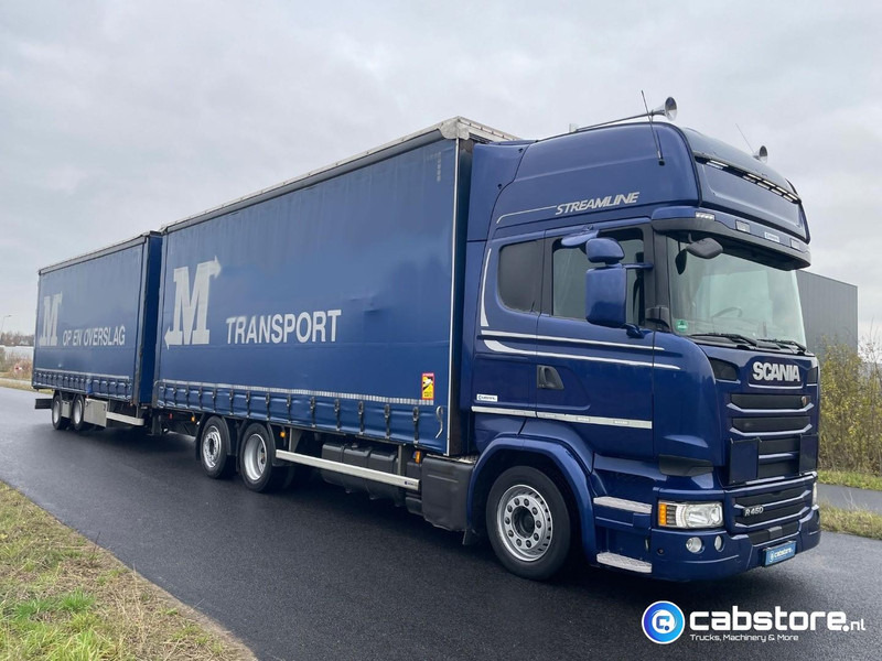 Scania R450 LB6X2MLB Euro 6 - Bouwjaar 2016 - Topline - Doorlaad-volume combi+ Wecon Middenas aanhangwagen - Good condition - Schuifzeilen vrachtwagen: afbeelding 1 Scania R450 LB6X2MLB Euro 6 - Bouwjaar 2016 - Topline - Doorlaad-volume combi+ Wecon Middenas aanhangwagen - Good condition - Schuifzeilen vrachtwagen: afbeelding 1