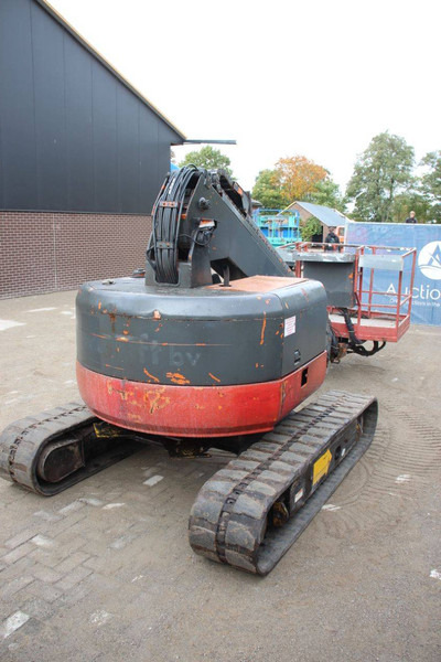 Hitachi HX99B - Telescoophoogwerker: afbeelding 5 Hitachi HX99B - Telescoophoogwerker: afbeelding 5