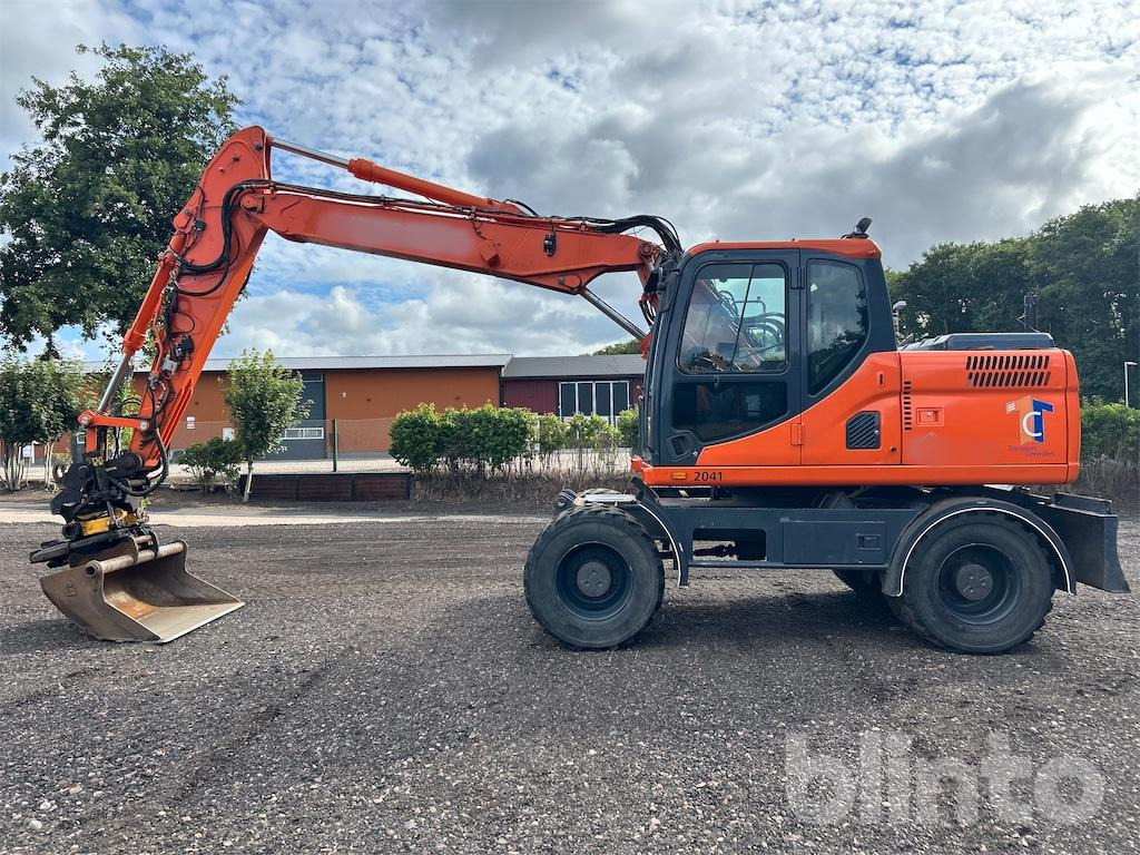 Doosan DX160W - Mobiele graafmachine: afbeelding 1 Doosan DX160W - Mobiele graafmachine: afbeelding 1