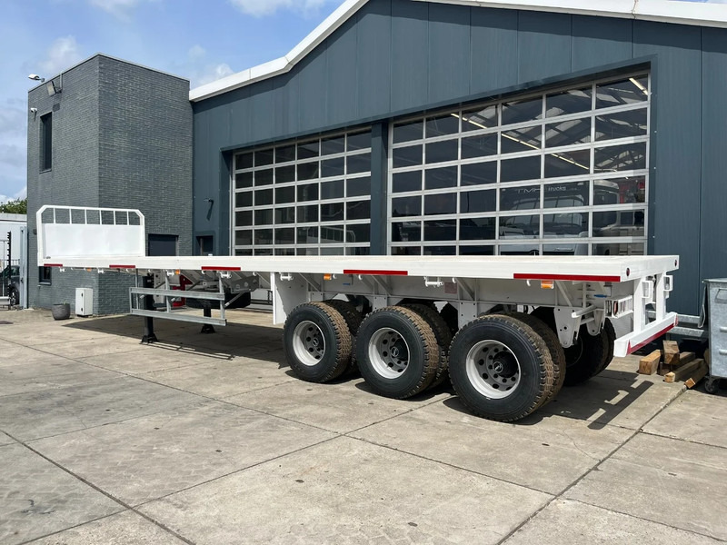 CIMC 3-axle Flatbed Semi-Trailer - Open bak met boorden oplegger: afbeelding 4 CIMC 3-axle Flatbed Semi-Trailer - Open bak met boorden oplegger: afbeelding 4
