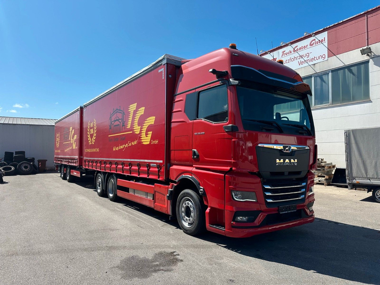 MAN 26.520 6x2 LL Durchlader Festaufbau, Anhänger - Schuifzeilen vrachtwagen: afbeelding 1 MAN 26.520 6x2 LL Durchlader Festaufbau, Anhänger - Schuifzeilen vrachtwagen: afbeelding 1